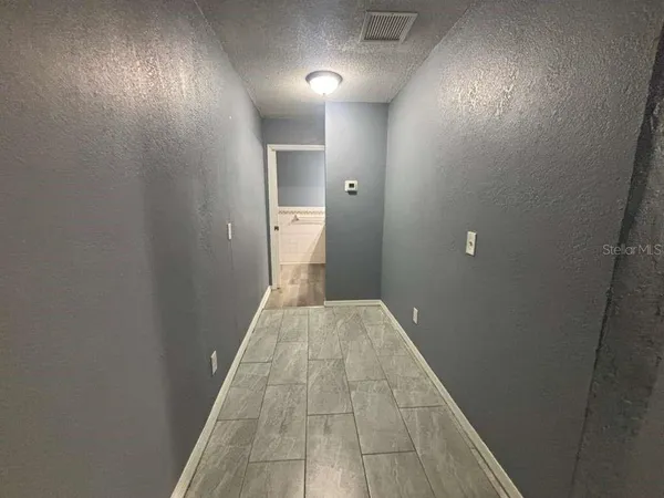a bathroom with a white tub