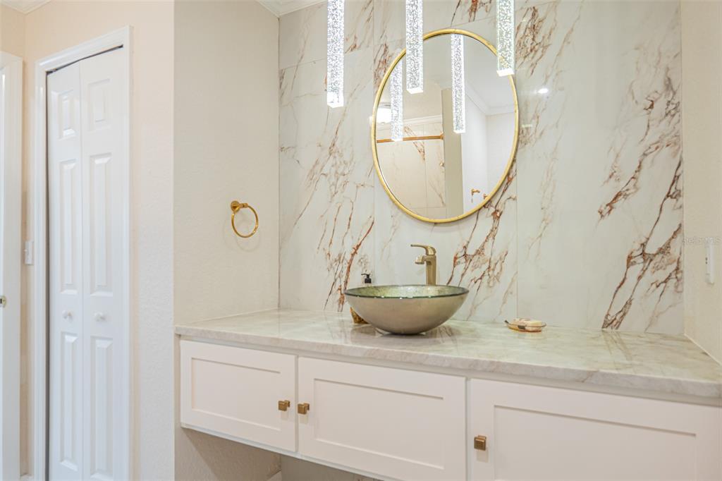 741 Brookside Road Maitland, FL 32751 - Photo 35 of 43 a bathroom with a sink and a mirror
