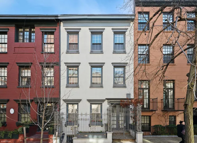 a picture of a book and a bed