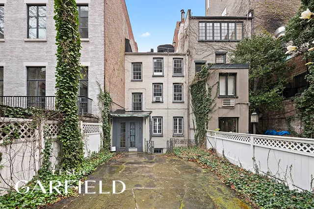 a view of a garden with pathway