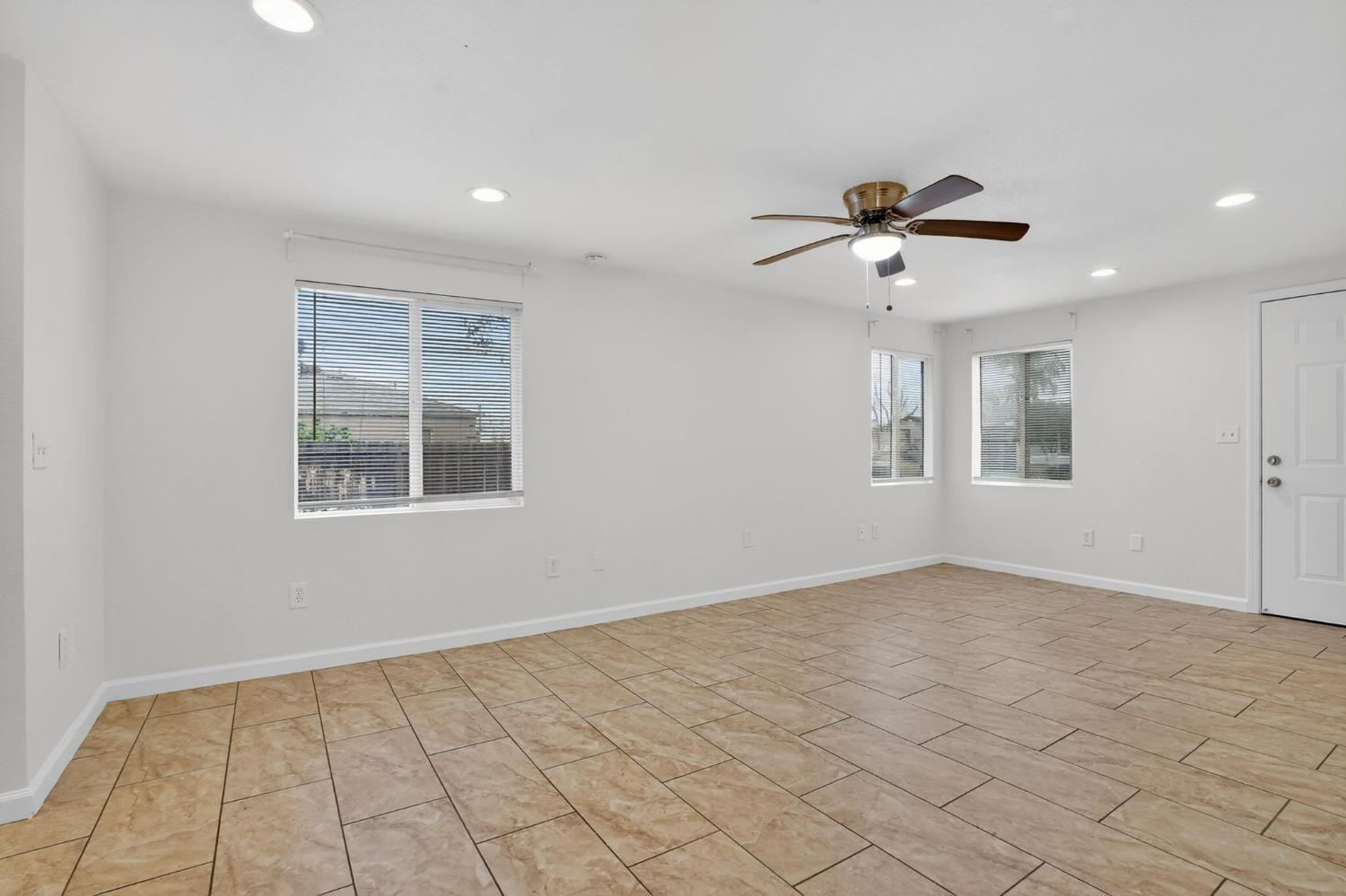 418 East Granger Avenue Modesto, CA 95350 - Photo 8 of 23 a view of an empty room with a window