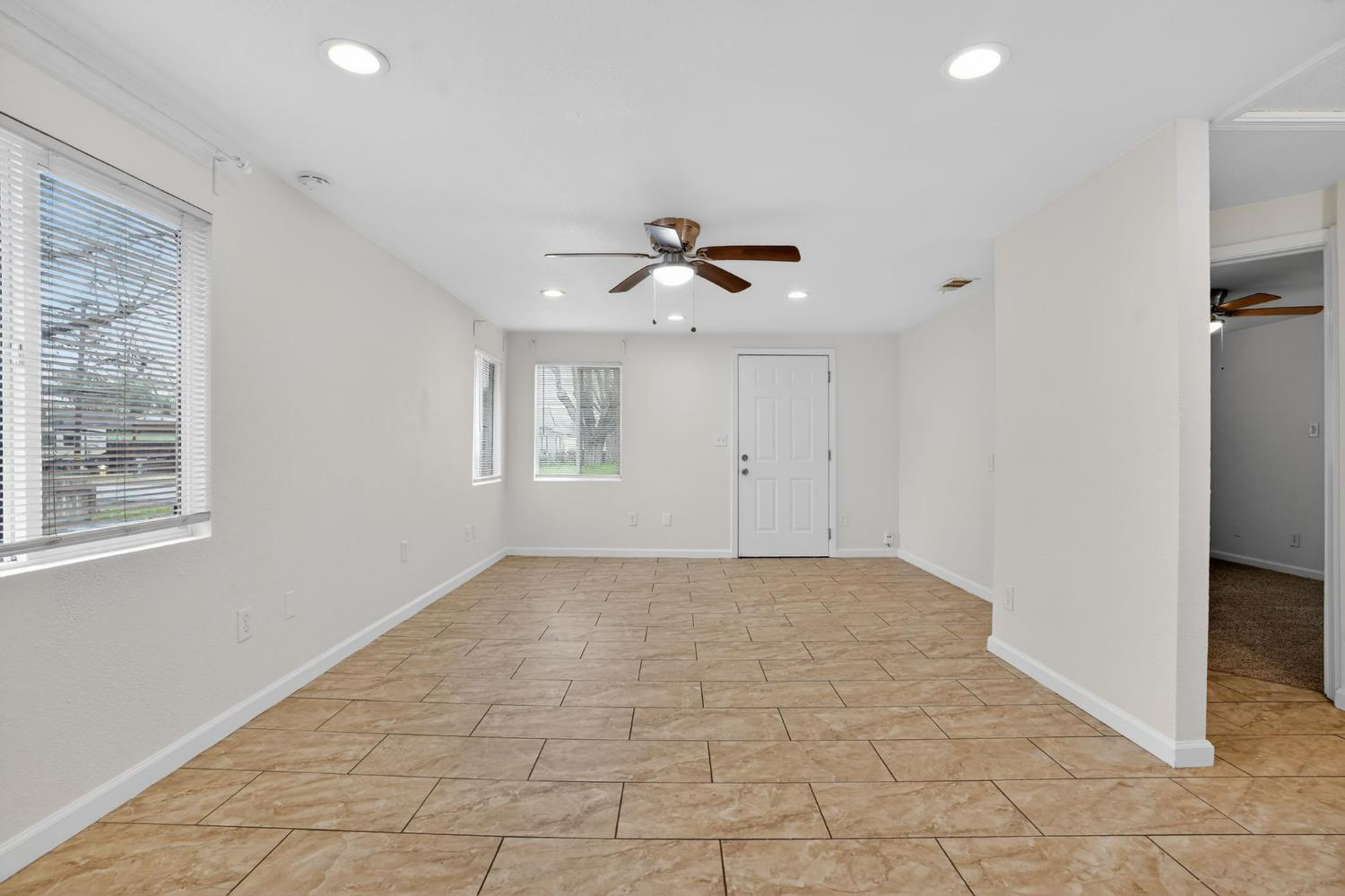 418 East Granger Avenue Modesto, CA 95350 - Photo 9 of 23 a view of an empty room with a window