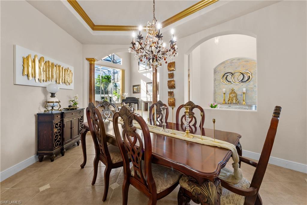 19261 La Serena Drive Estero, FL 33967 - Photo 22 of 48 a view of a dining room with furniture and chandelier
