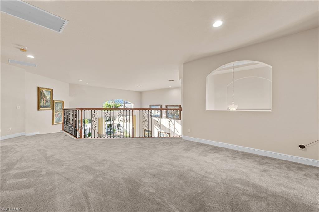 19261 La Serena Drive Estero, FL 33967 - Photo 42 of 48 a view of a livingroom with an empty space and a window
