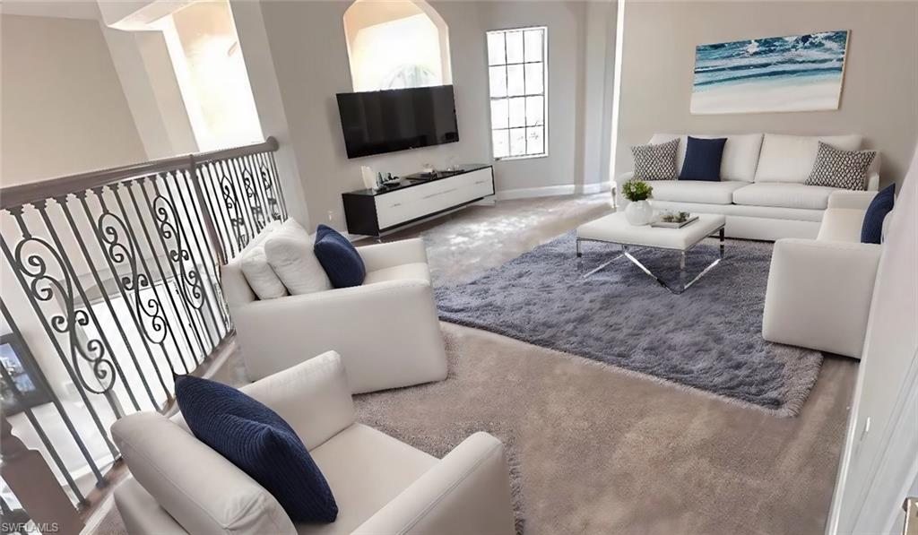 19261 La Serena Drive Estero, FL 33967 - Photo 43 of 48 a living room with furniture and a flat screen tv