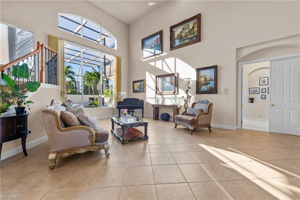 19261 La Serena Drive Estero, FL 33967 - Photo 8 of 48 a living room with furniture and a large window