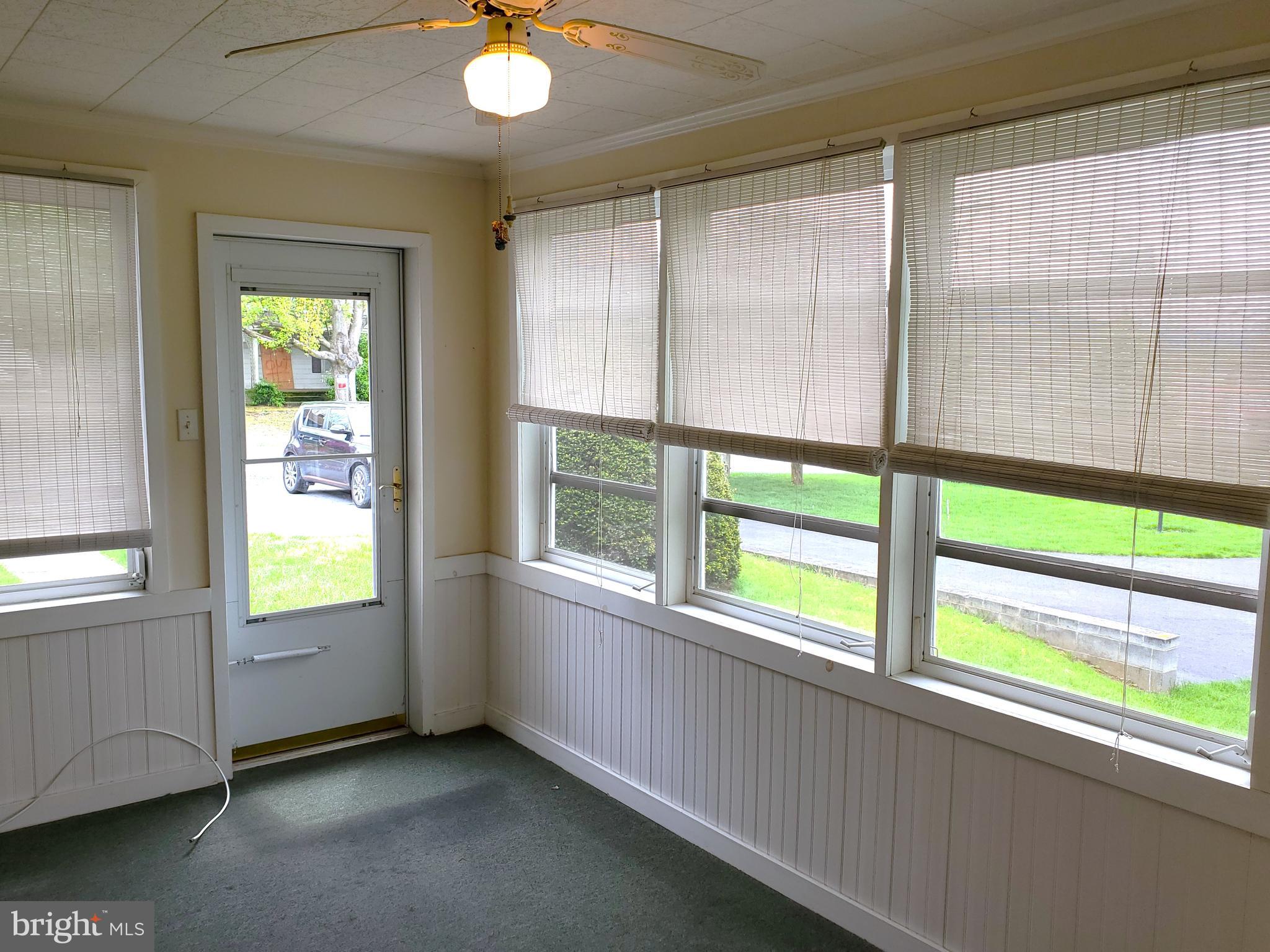 12955 Old Forge Road Waynesboro, PA 17268 - Photo 19 of 42 Sunroom walks out to front drive-way