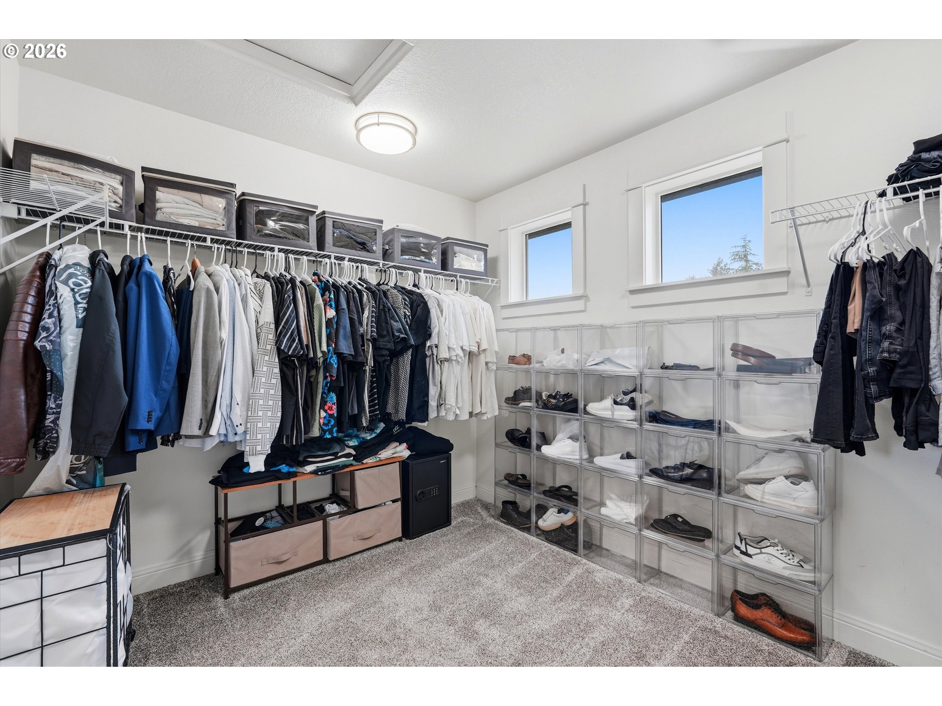 2923 Southwest 40th Street Gresham, OR 97080 - Photo 13 of 37 a view of walk in closet with clothes and shoes