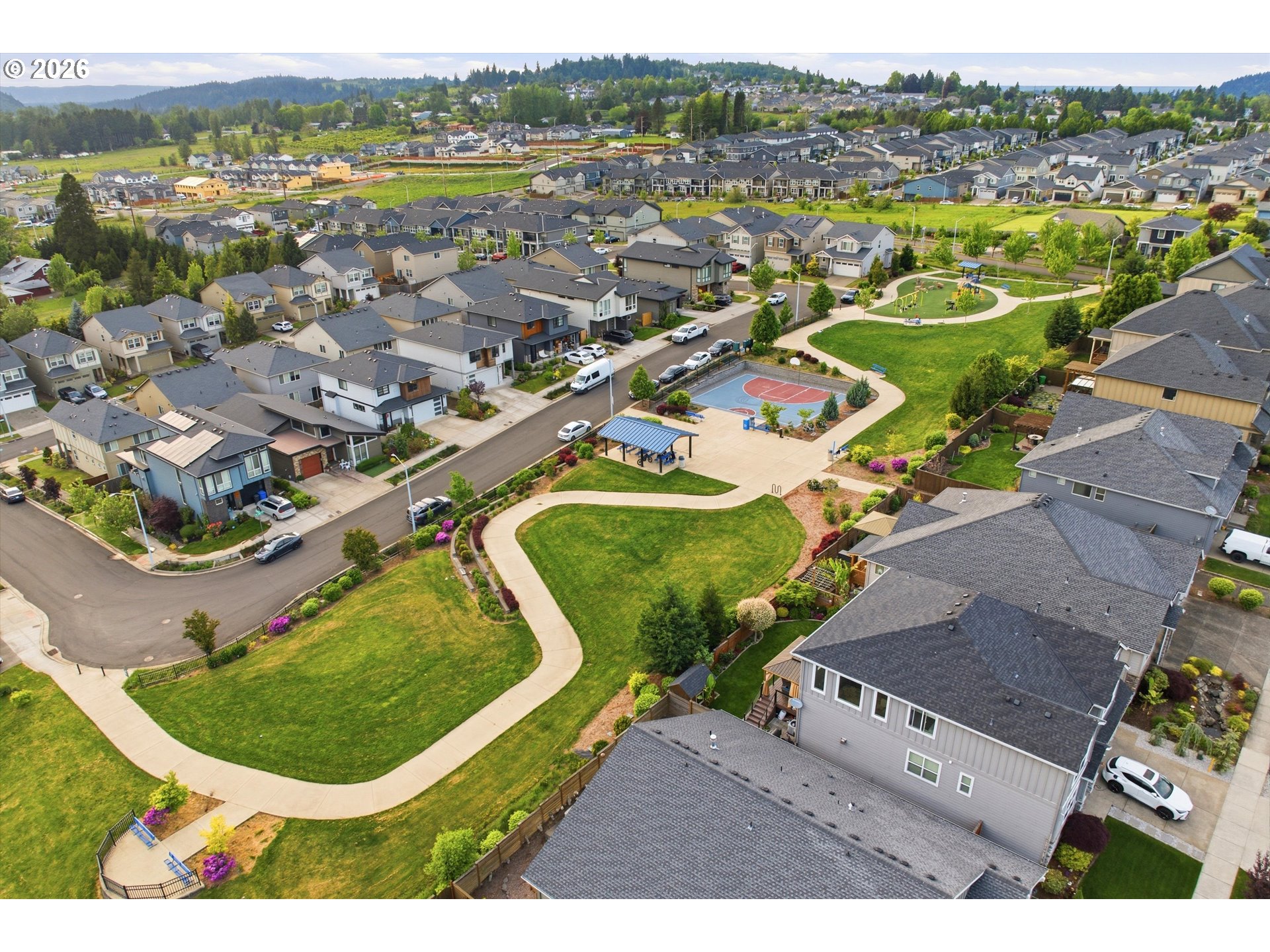 2923 Southwest 40th Street Gresham, OR 97080 - Photo 3 of 37 an aerial view of residential houses with outdoor space