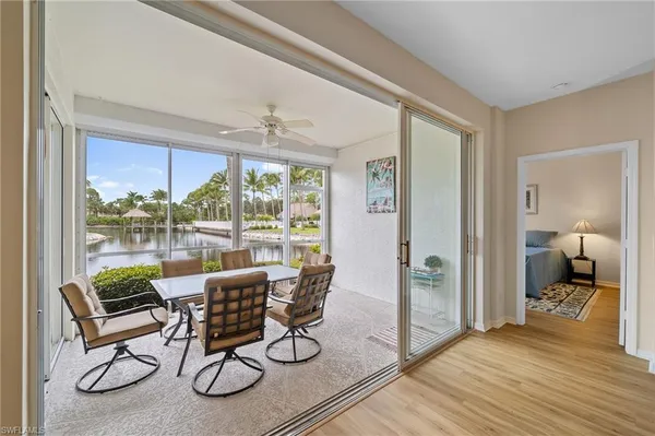 a workspace with wooden floor and a balcony
