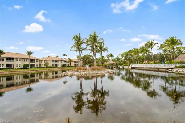 a view of residential houses with outdoor space