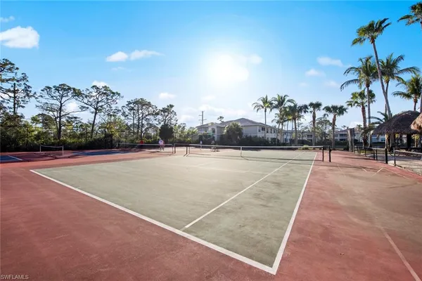 a view of outdoor space and tennis court