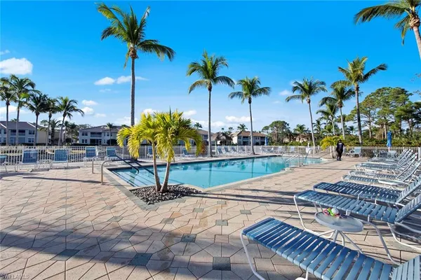 a view of swimming pool with patio
