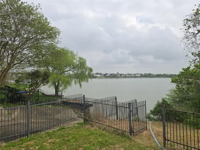 a view of a wrought iron bridge