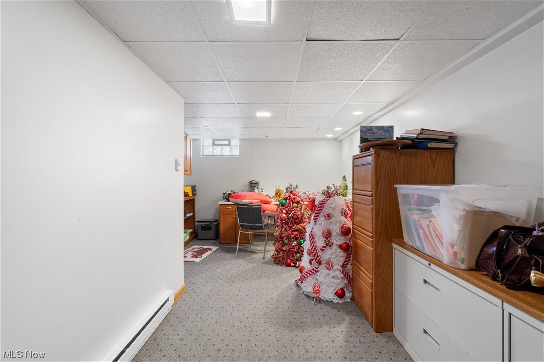 8366 Turquoise Avenue Northeast Canton, OH 44721 - Photo 21 of 26 Office or craft room in the finished basement with baseboard heat.