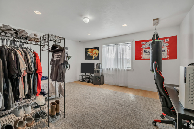 3054 West Ridgeline Road Stockton, UT 84071 - Photo 58 of 88 Walk in closet featuring light wood finished floors
