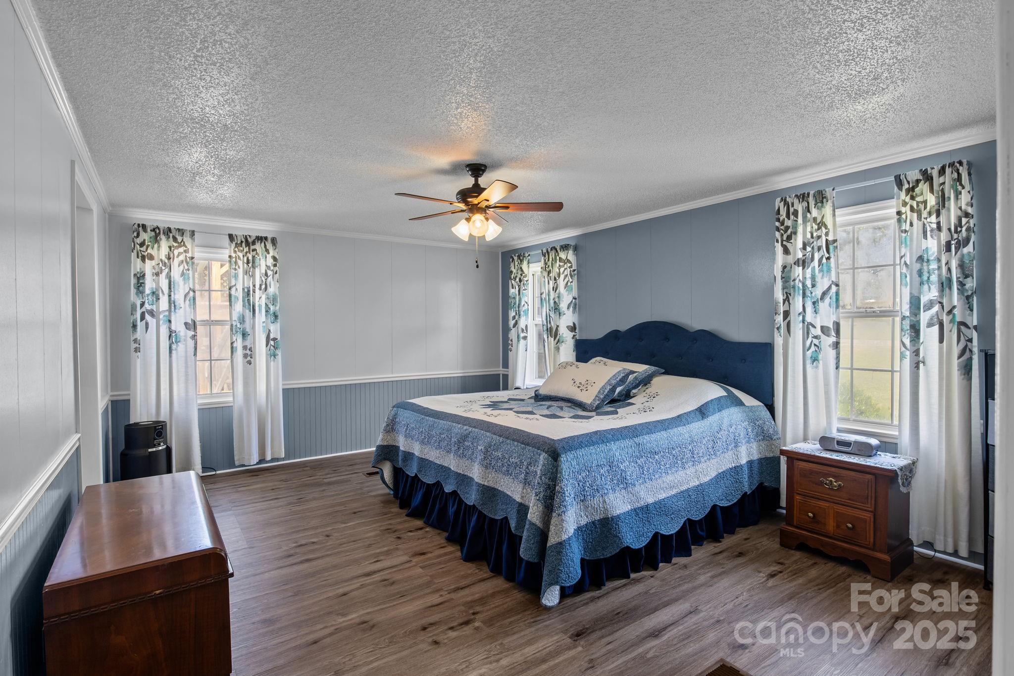555 Fairmount Road Statesville, NC 28625 - Photo 23 of 48 a living room with a bed furniture and a window