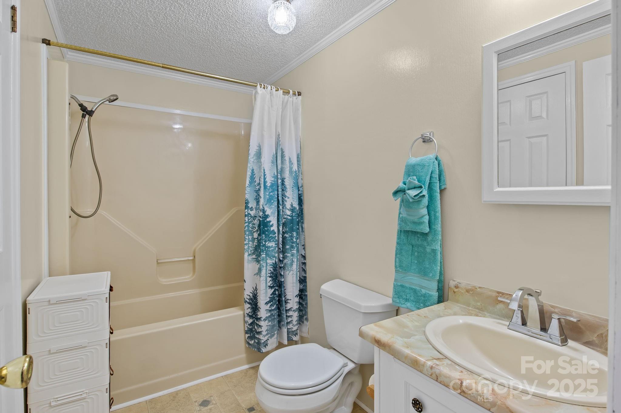 555 Fairmount Road Statesville, NC 28625 - Photo 30 of 48 a bathroom with a granite countertop sink toilet and shower