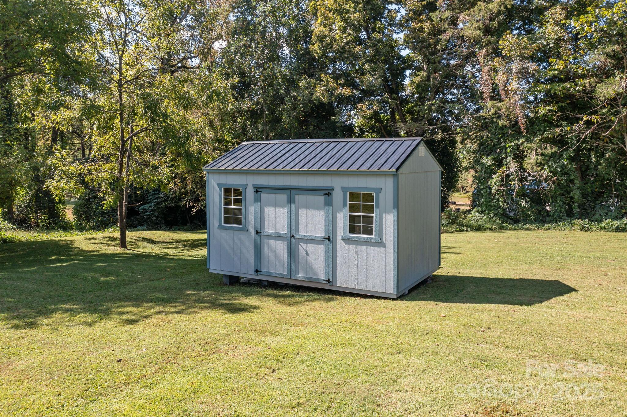 555 Fairmount Road Statesville, NC 28625 - Photo 36 of 48 a view of a house with a yard
