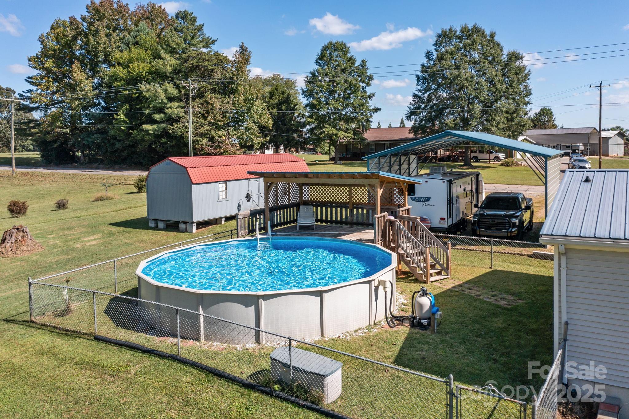 555 Fairmount Road Statesville, NC 28625 - Photo 46 of 48 a view of a swimming pool with a patio