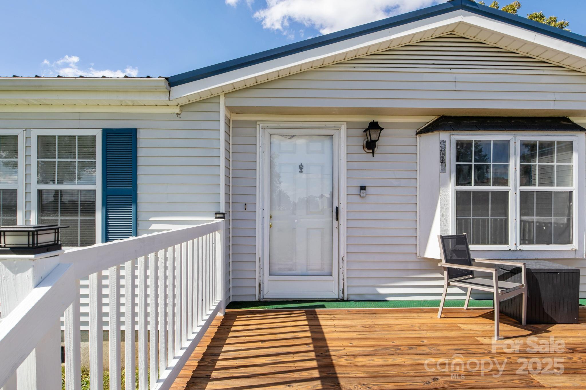 555 Fairmount Road Statesville, NC 28625 - Photo 6 of 48 a view of a house with a porch