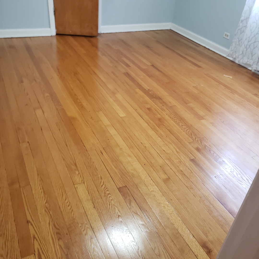 2724 West Gregory Street, Unit 2 Chicago, IL 60625 - Photo 12 of 15 a view of empty room with wooden floor and fan