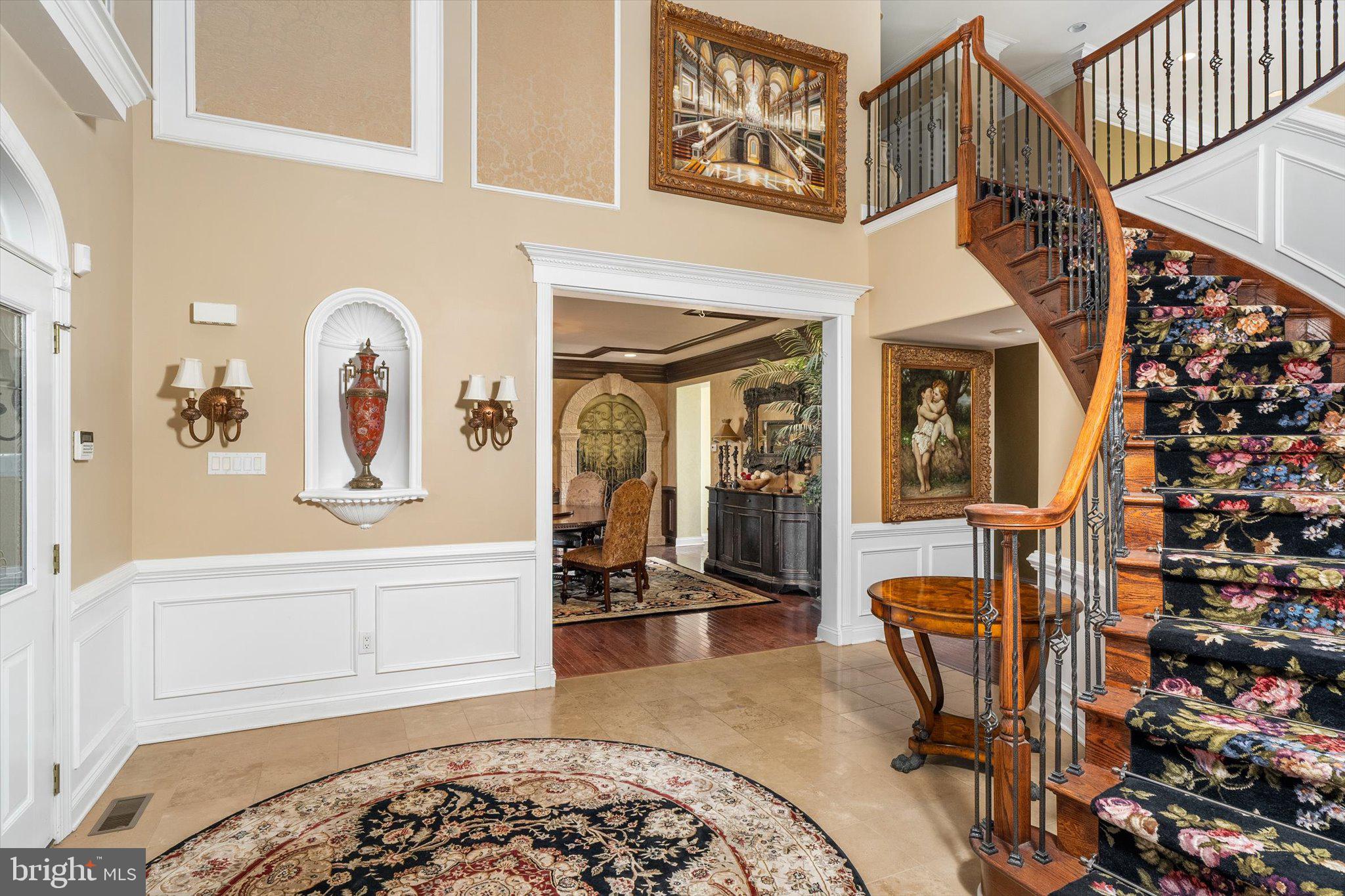 30 Ridgeview Way Allentown, NJ 08501 - Photo 11 of 57 a view of a livingroom with furniture and staircase