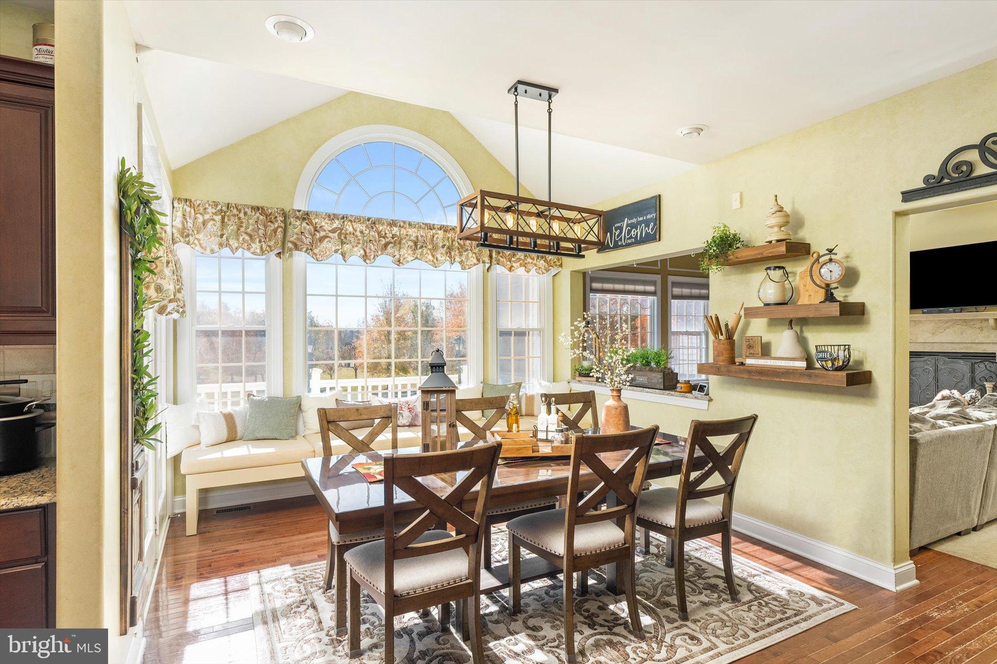 30 Ridgeview Way Allentown, NJ 08501 - Photo 25 of 57 a view of a dining room with furniture wooden floor and a chandelier