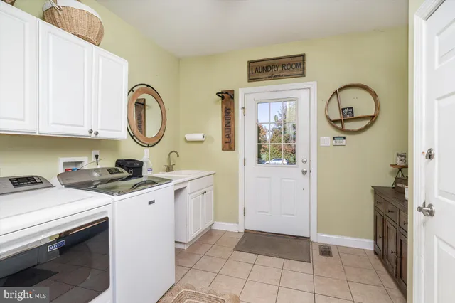 a view of a hallway with furniture