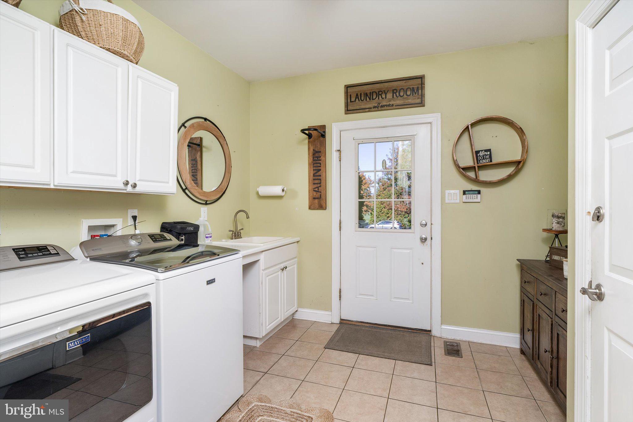 30 Ridgeview Way Allentown, NJ 08501 - Photo 28 of 57 a kitchen with a sink cabinets and a stove top oven