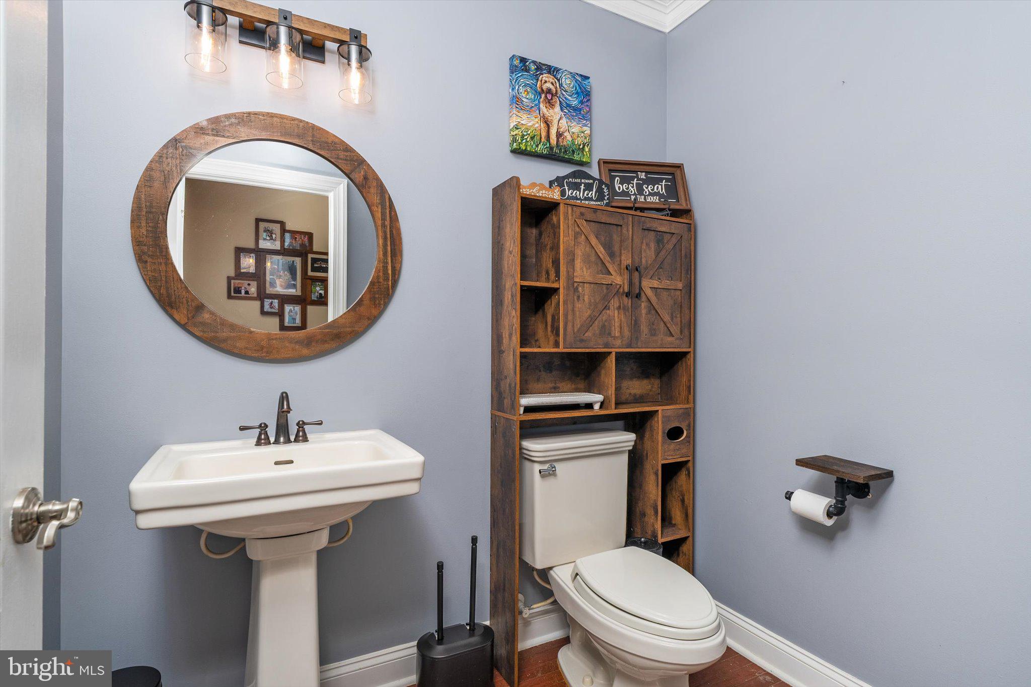 30 Ridgeview Way Allentown, NJ 08501 - Photo 29 of 57 a bathroom with a toilet a sink and mirror