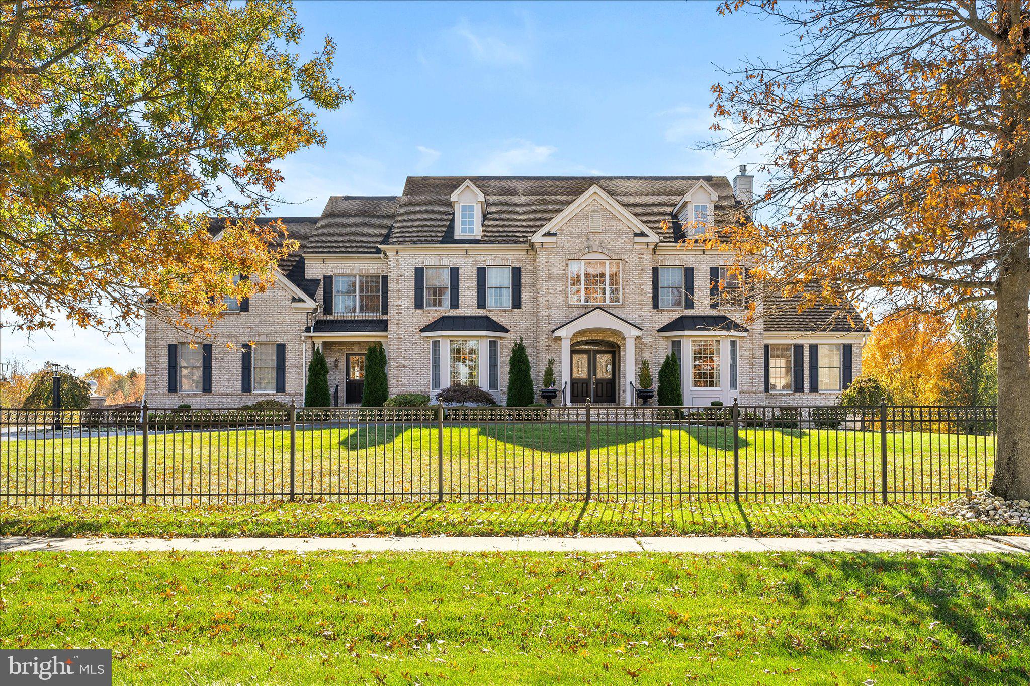 30 Ridgeview Way Allentown, NJ 08501 - Photo 3 of 57 a front view of a house with a yard
