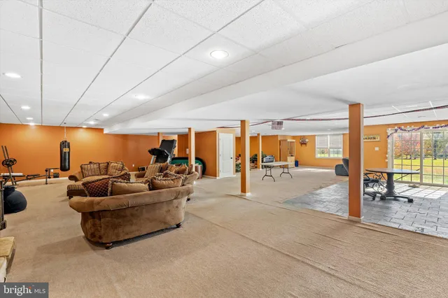 an aerial view of residential building and lake