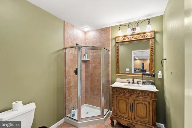 an aerial view of residential building and lake