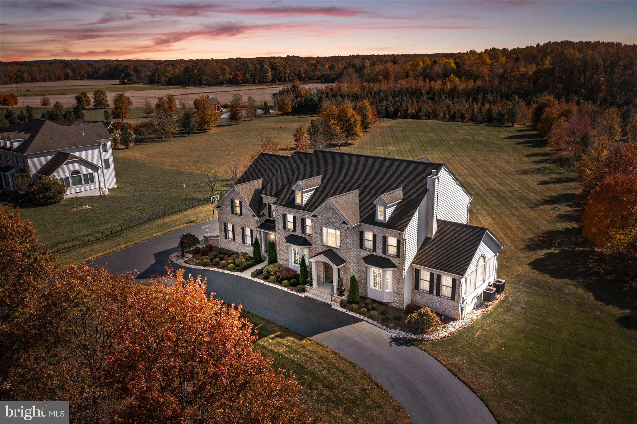 30 Ridgeview Way Allentown, NJ 08501 - Photo 7 of 57 a view of a balcony with two chairs and a table