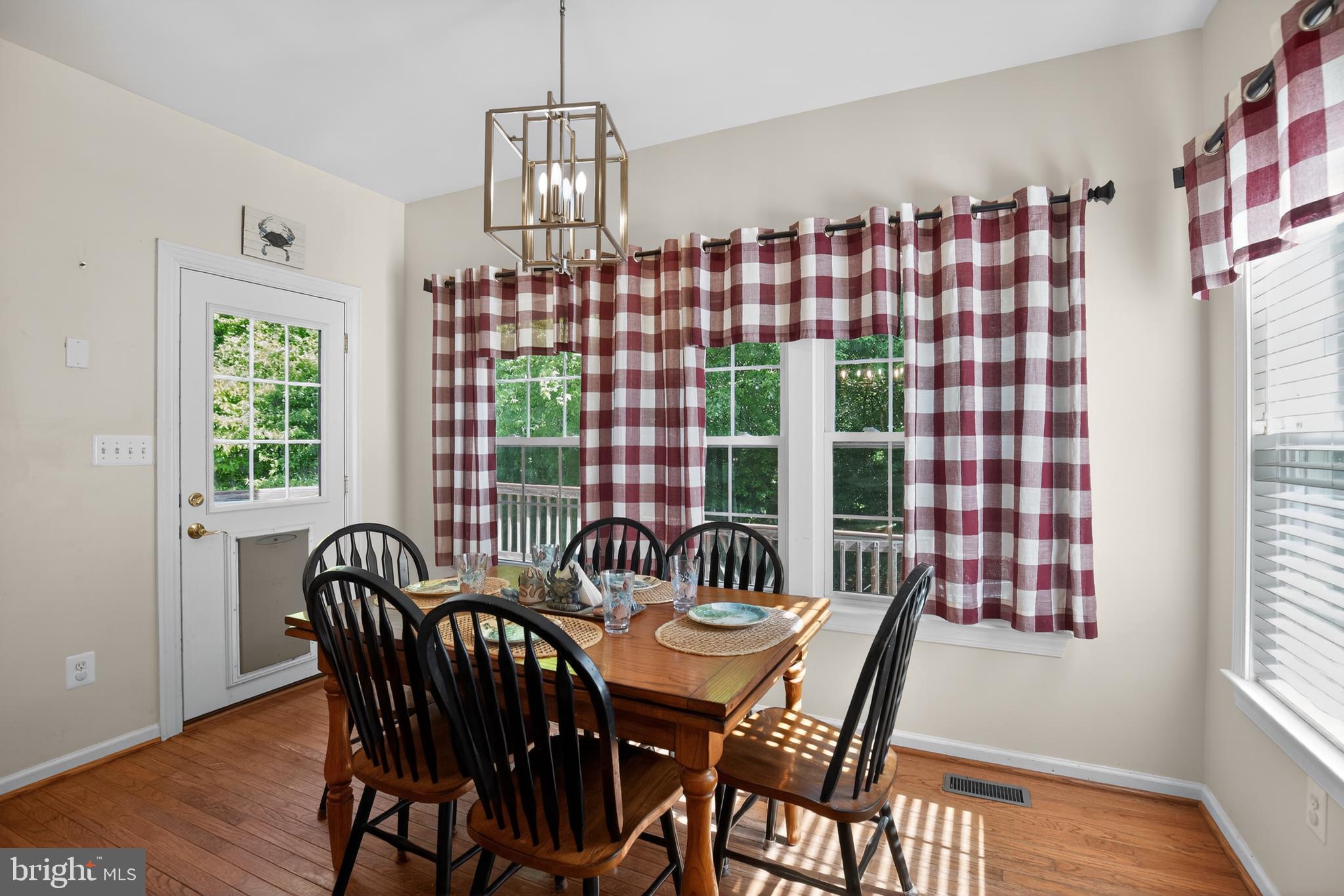 1810 Rudolph Lane Lusby, MD 20657 - Photo 13 of 40 Full size table space & windows for sunlight