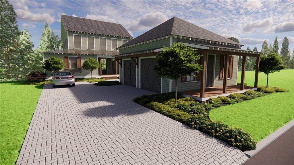 69 Maple Street Roswell, GA 30075 - Photo 1 of 22 a front view of a house with garden