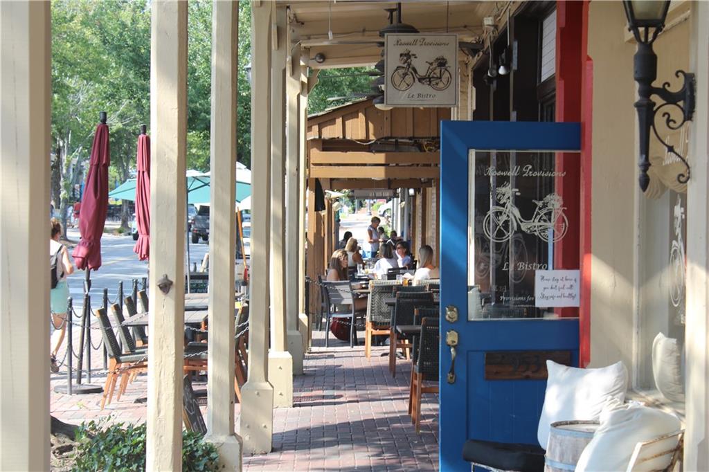 69 Maple Street Roswell, GA 30075 - Photo 13 of 22 a view of living room and entry way