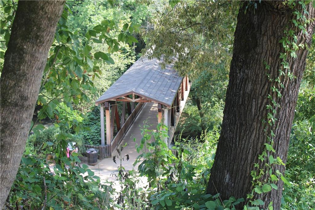 69 Maple Street Roswell, GA 30075 - Photo 14 of 22 an aerial view of a house with a yard