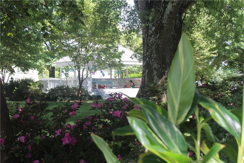 69 Maple Street Roswell, GA 30075 - Photo 15 of 22 a view of a garden