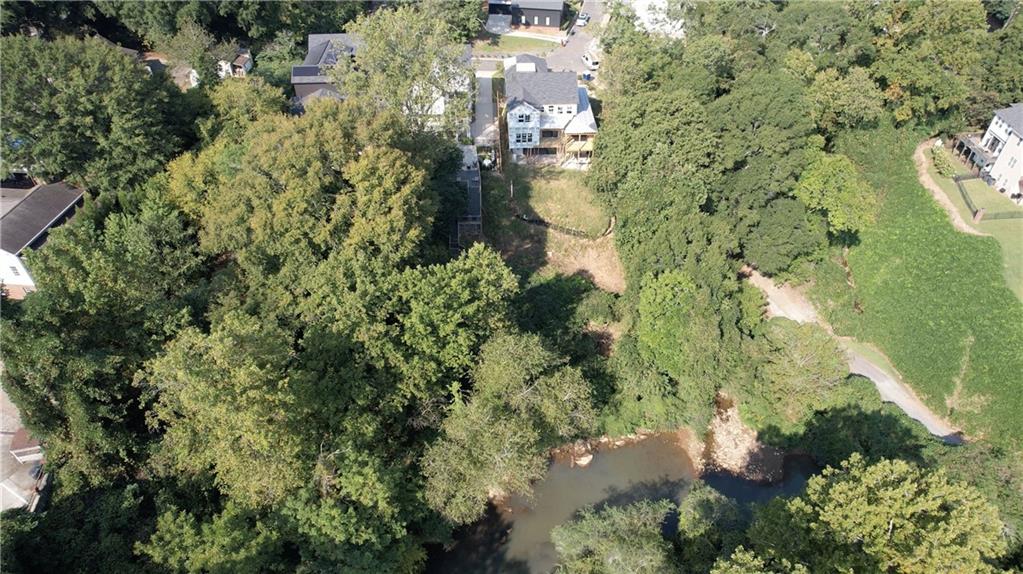 69 Maple Street Roswell, GA 30075 - Photo 19 of 22 an aerial view of residential houses with outdoor space