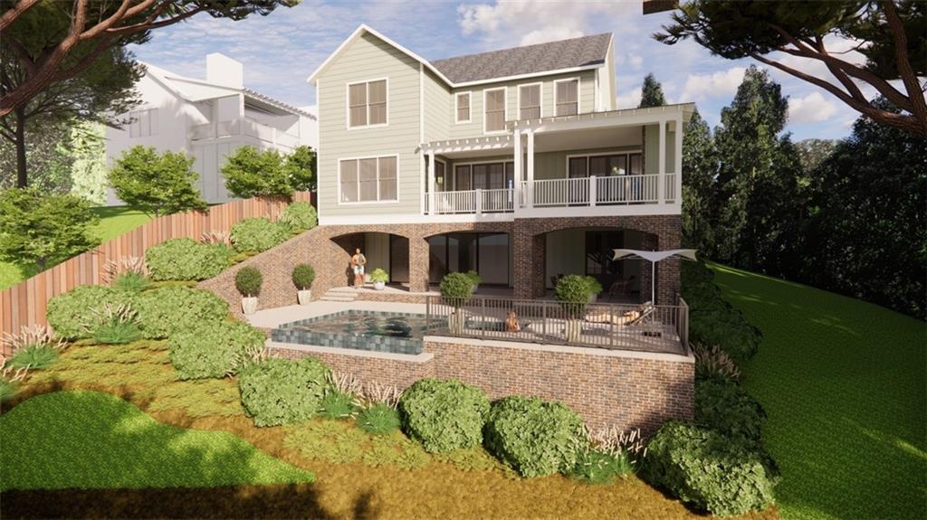 69 Maple Street Roswell, GA 30075 - Photo 2 of 22 a front view of a house with swimming pool and porch