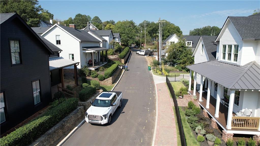 69 Maple Street Roswell, GA 30075 - Photo 22 of 22 an aerial view of a house with a yard