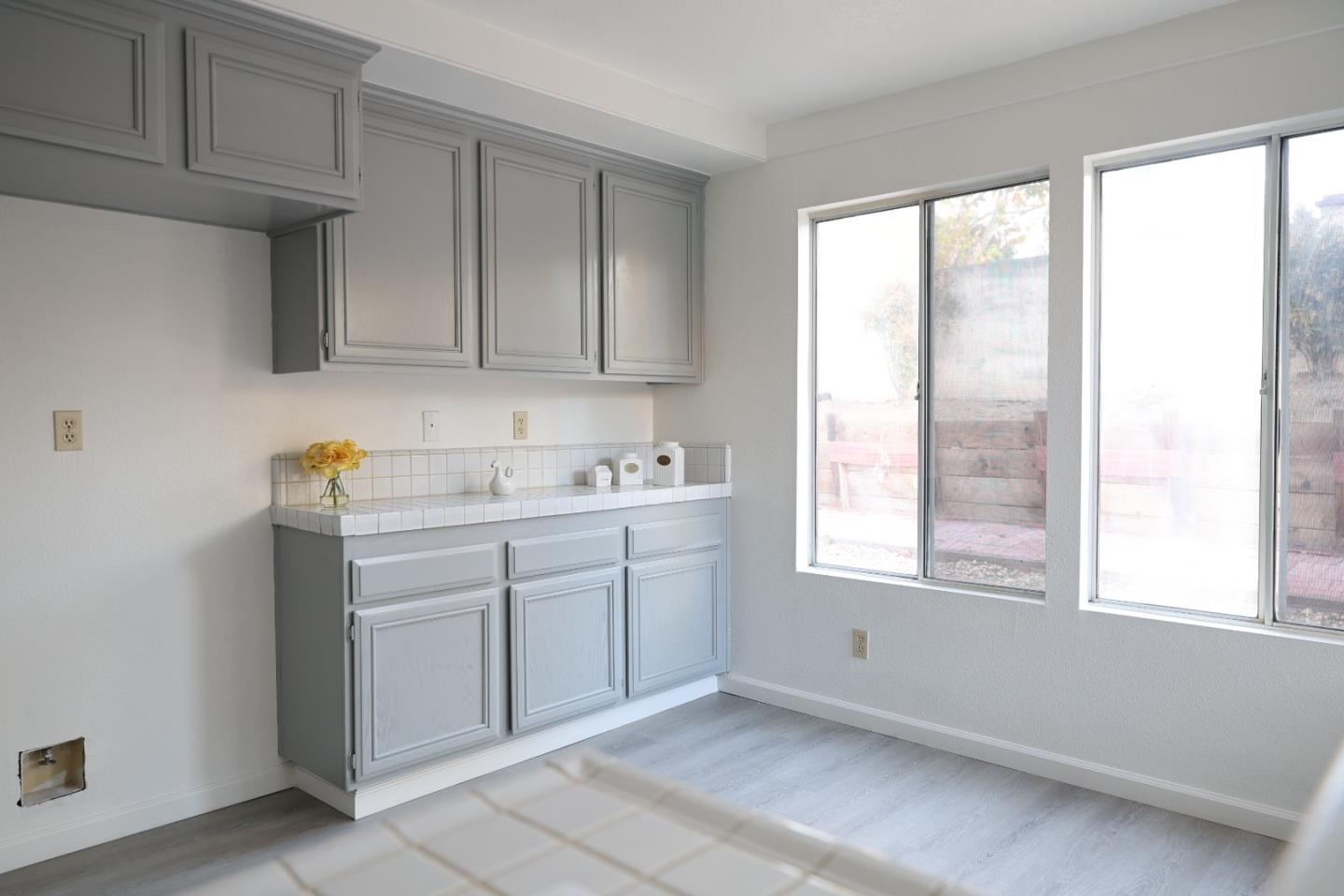 5012 Rodeo Circle Antioch, CA 94531 - Photo 11 of 36 a utility room with cabinets washer and dryer