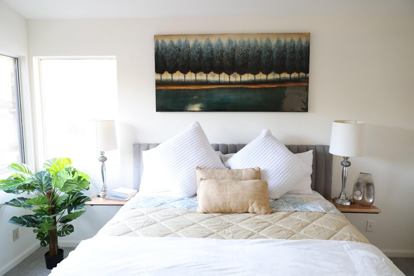 5012 Rodeo Circle Antioch, CA 94531 - Photo 17 of 36 a bed sitting in a bedroom next to a lamp