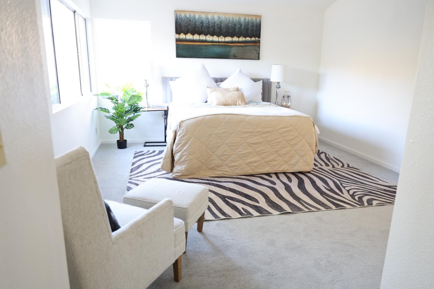 5012 Rodeo Circle Antioch, CA 94531 - Photo 19 of 36 a bedroom with a bed and a couch