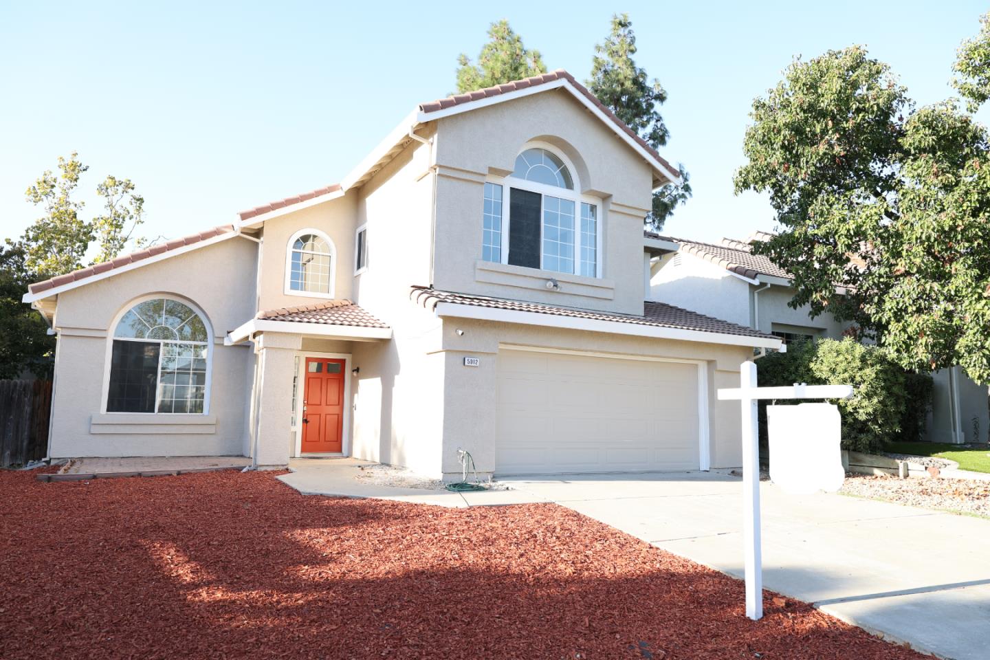 5012 Rodeo Circle Antioch, CA 94531 - Photo 2 of 36 a front view of a house with a yard and garage