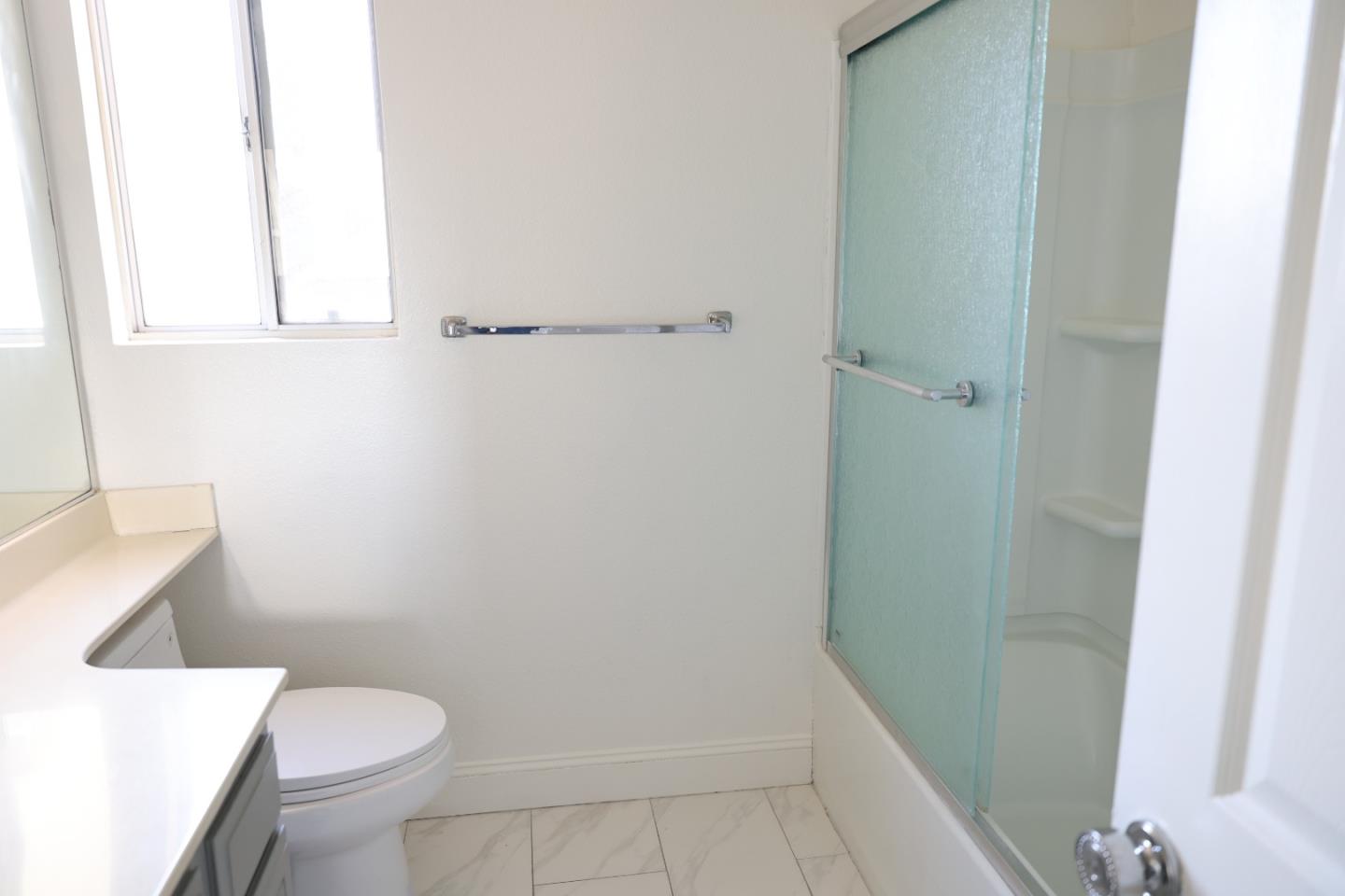 5012 Rodeo Circle Antioch, CA 94531 - Photo 29 of 36 a white toilet sitting next to a shower