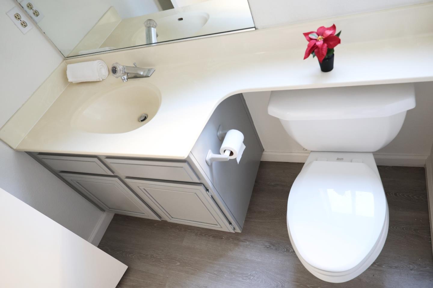 5012 Rodeo Circle Antioch, CA 94531 - Photo 31 of 36 a bathroom with a sink mirror and toilet