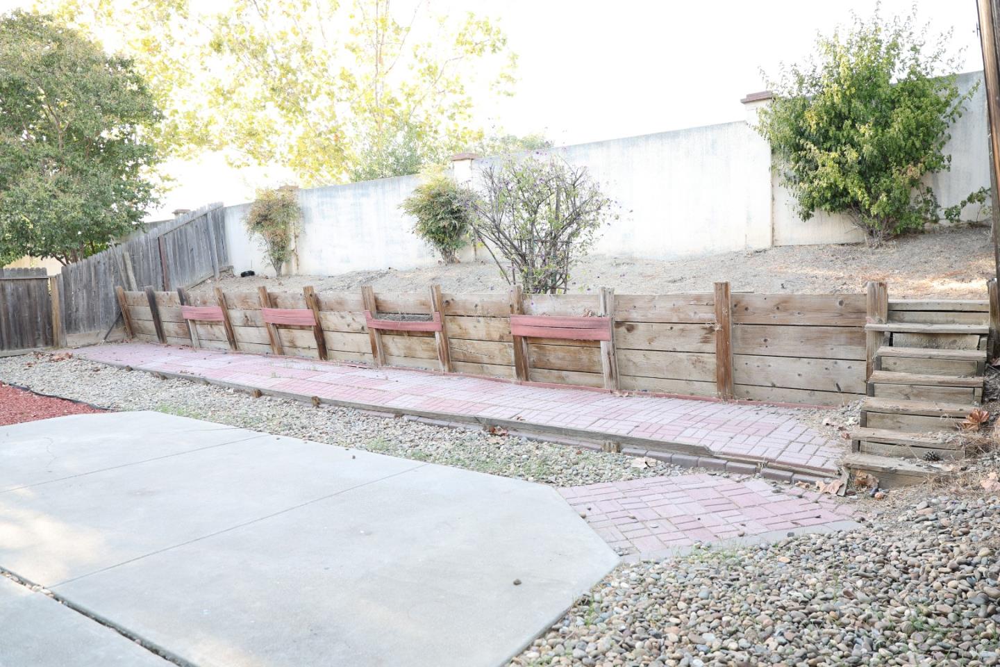 5012 Rodeo Circle Antioch, CA 94531 - Photo 36 of 36 a backyard of a house with barbeque oven and outdoor seating
